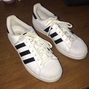 Adidas superstar sneakers.